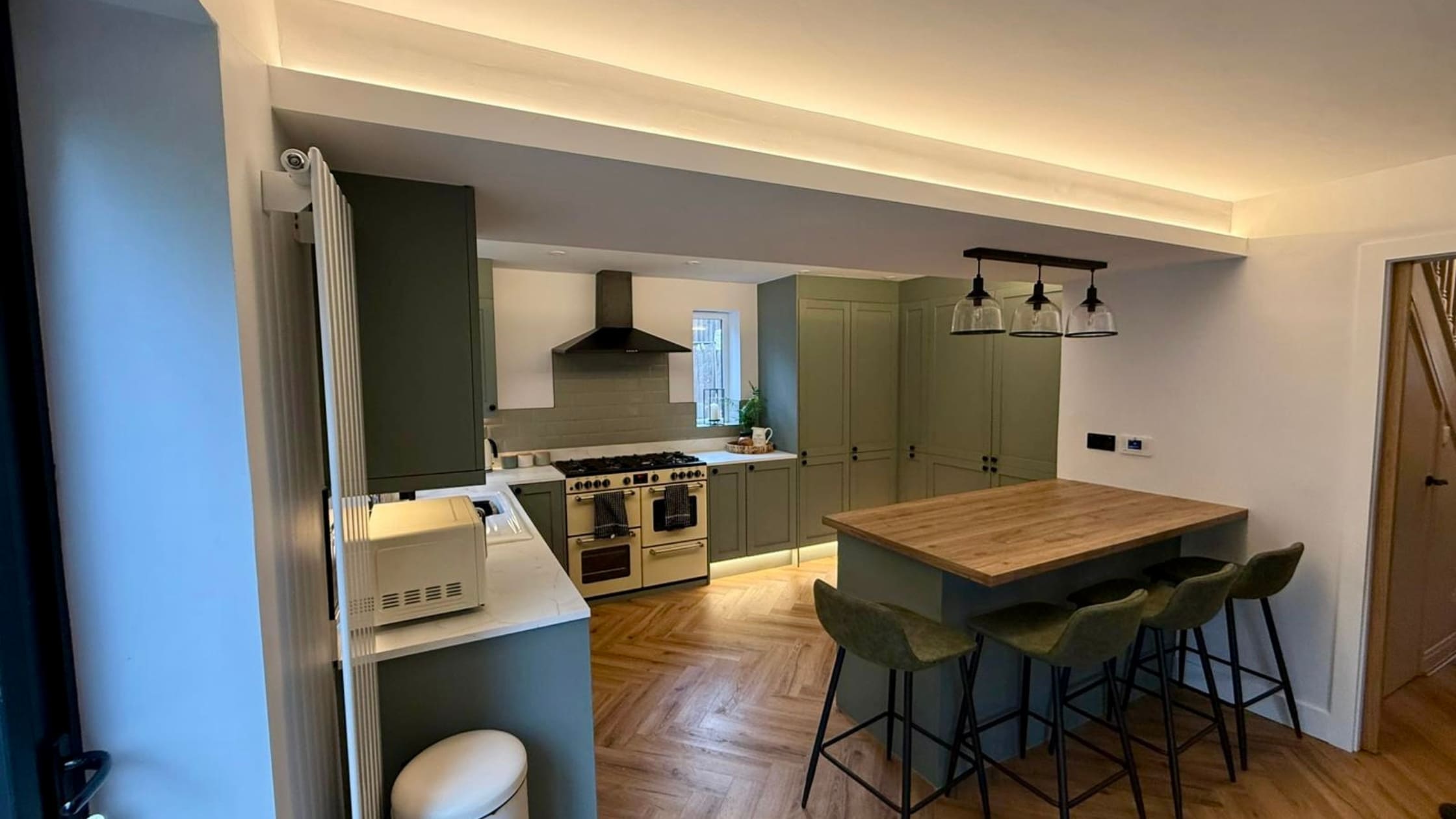 2 Completed house renovation by builders in Port Talbot.