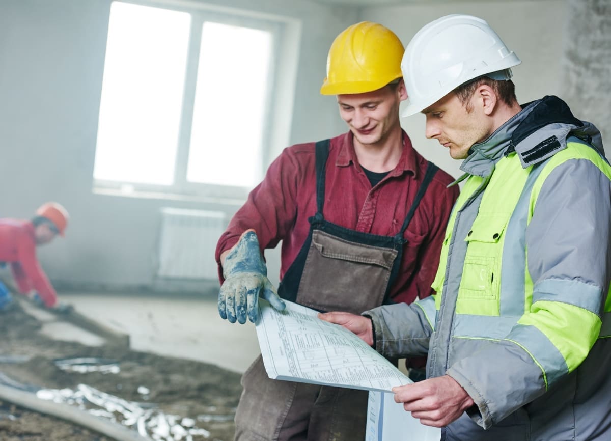 builders discussing building plans
